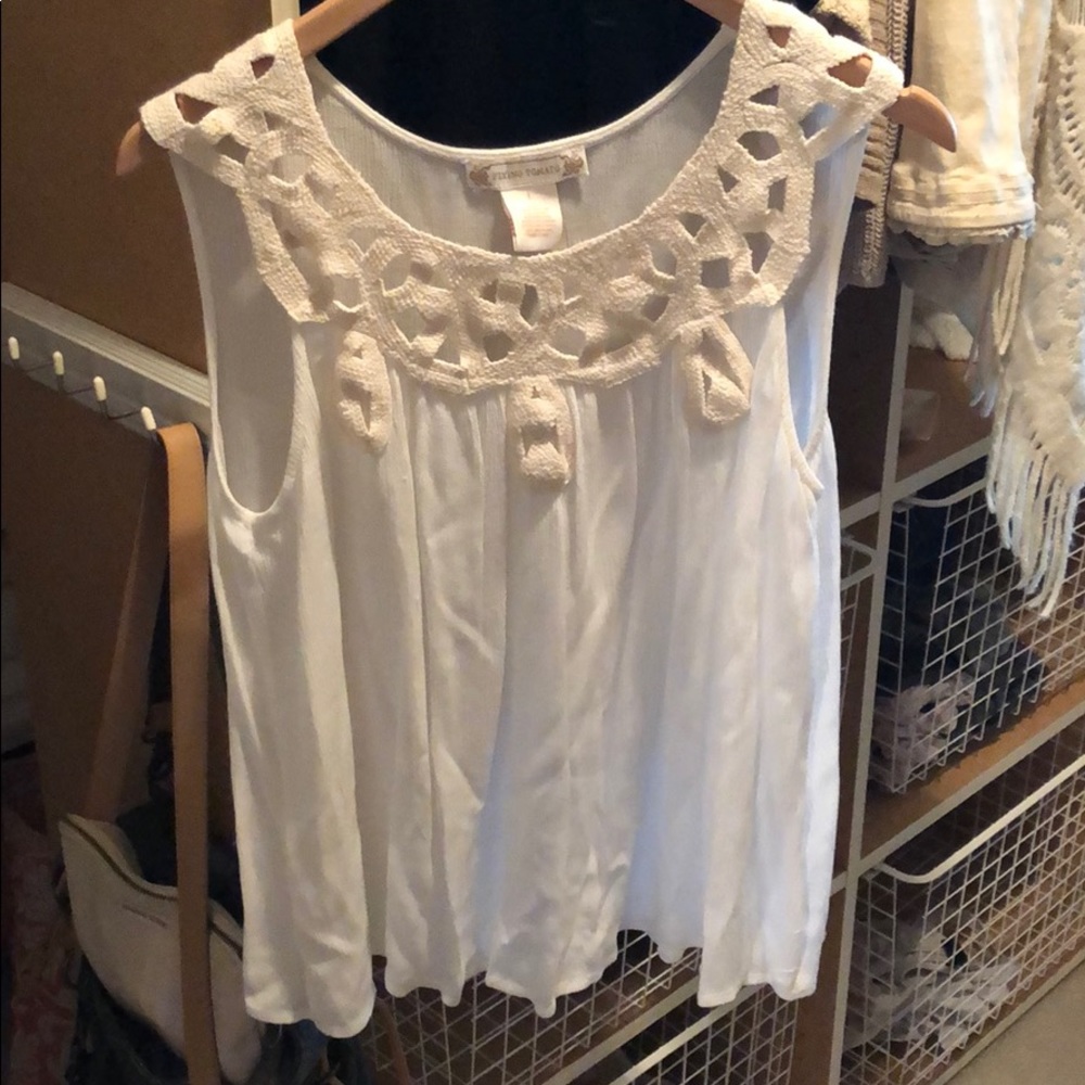 Cream sleeveless top with lace detail